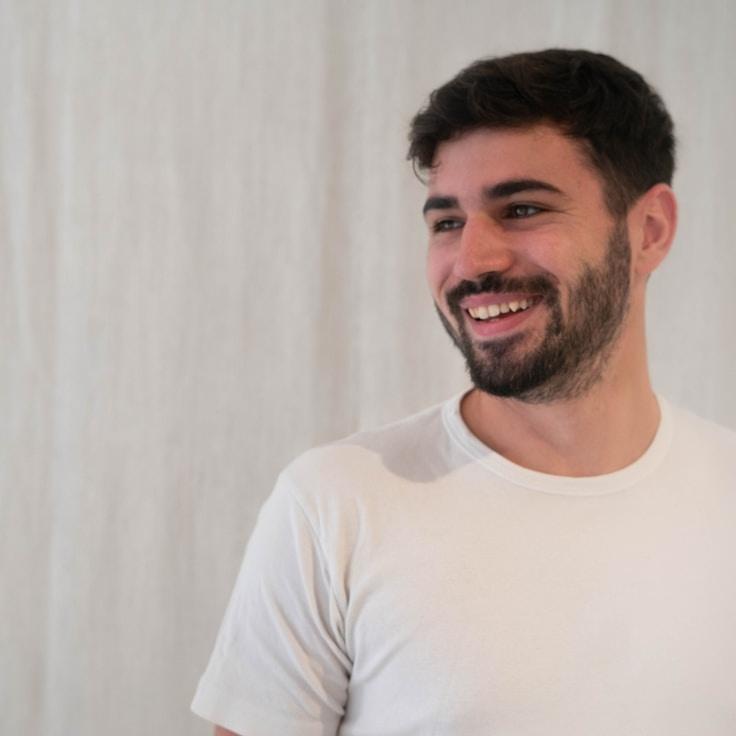 Portrait of Alex Carter, community mentor and Italian cuisine specialist